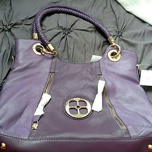 Iman brand new purple leather purse